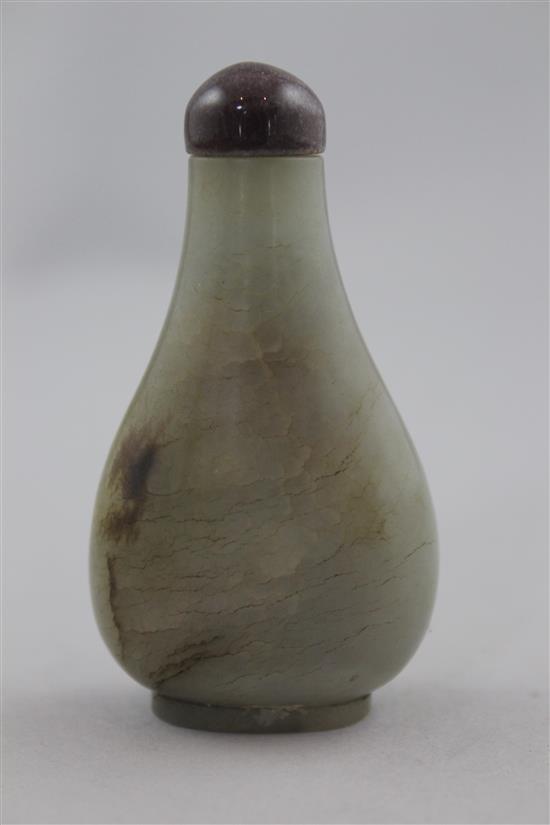 A Chinese celadon and brown jade pear shaped snuff bottle, 1750-1850, 6.1cm